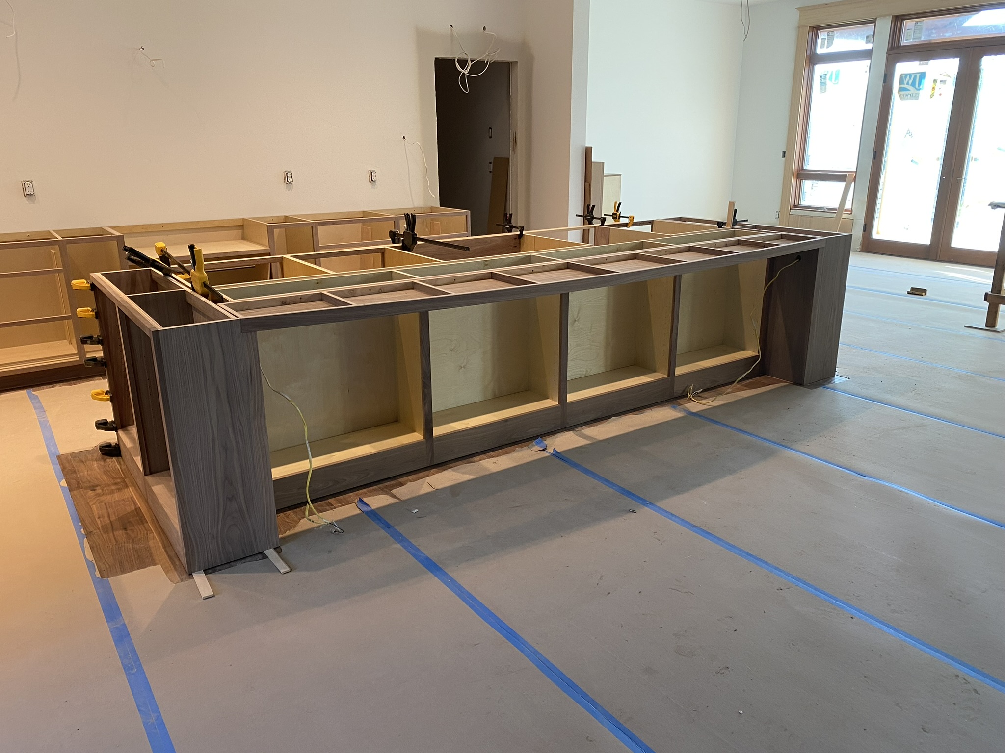 Walter's team installing custom cabinetry at a client's home